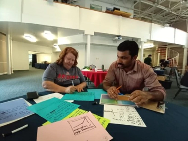 Participants creating field-based agrivoltaics curriculum