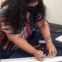 STEM educator Agrivoltaics Institute participant constructing an agrivoltaic kit